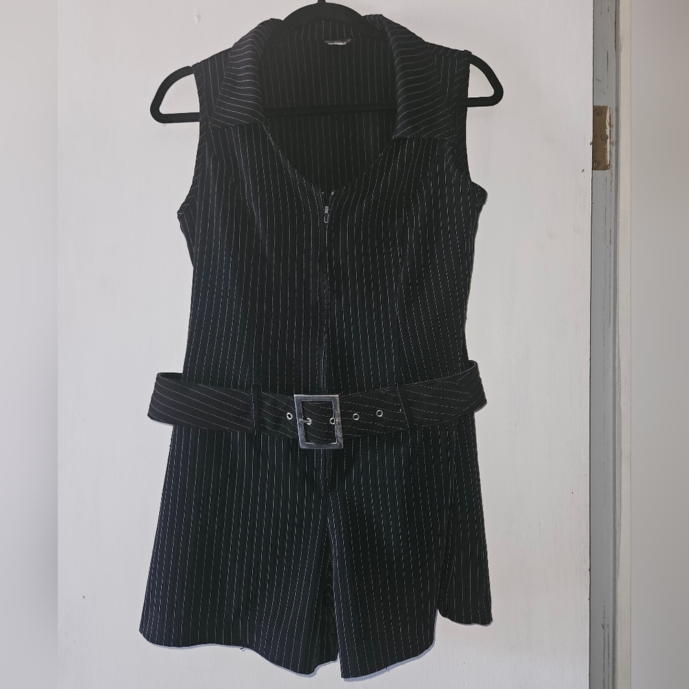 Pinstripe jumper with front zipper and belt.